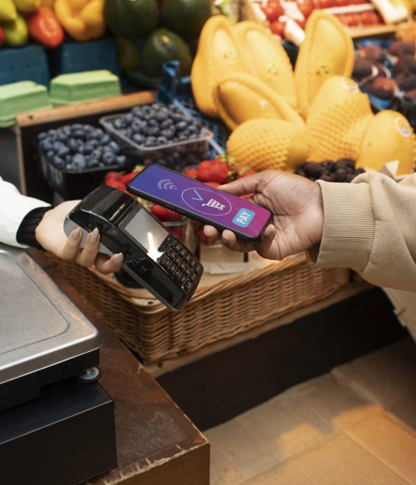 close-up-hand-paying-with-phone